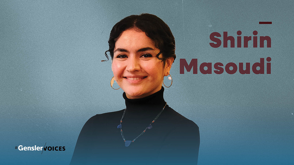 A person smiling for the camera.